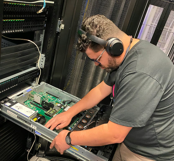 Engineer servicing a server